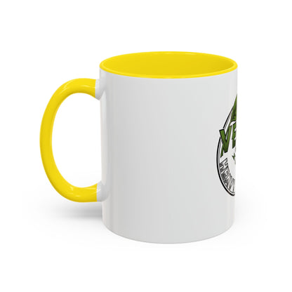 Glossy ceramic coffee mug with Vegan Heavy Metal logo, white exterior, colored handle and interior.