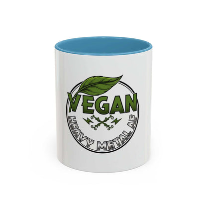Vegan Heavy Metal Logo coffee mug with leafy green letters and lightning bolts on white ceramic
