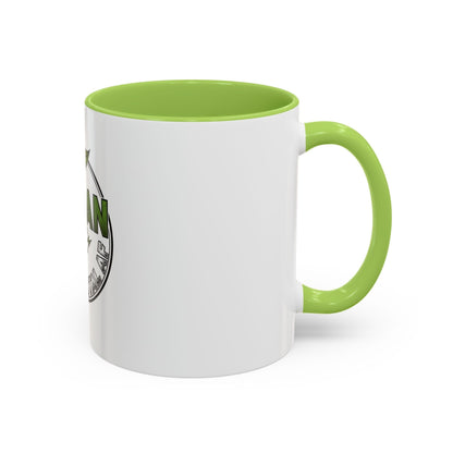 Glossy ceramic coffee mug with Vegan Heavy Metal Logo in green and metallic lettering on white with colored handle and interior