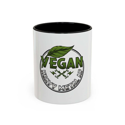 Glossy ceramic coffee mug with Vegan Heavy Metal Logo in green leafy letters and metallic accents, available in 11oz or 15oz sizes