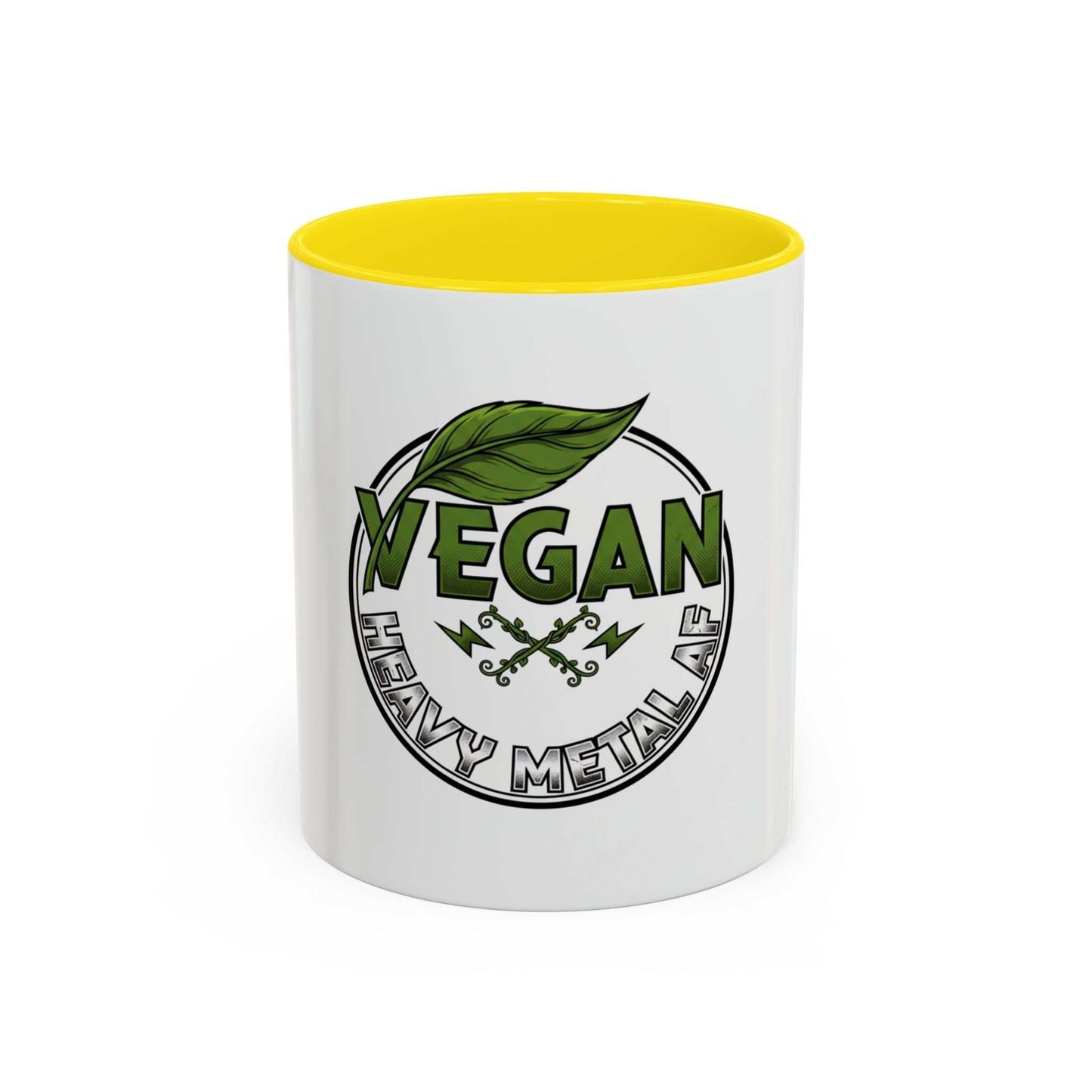 Glossy ceramic mug with Vegan Heavy Metal Logo featuring leafy green text and crossed lightning bolts on white background with colored handle and interior