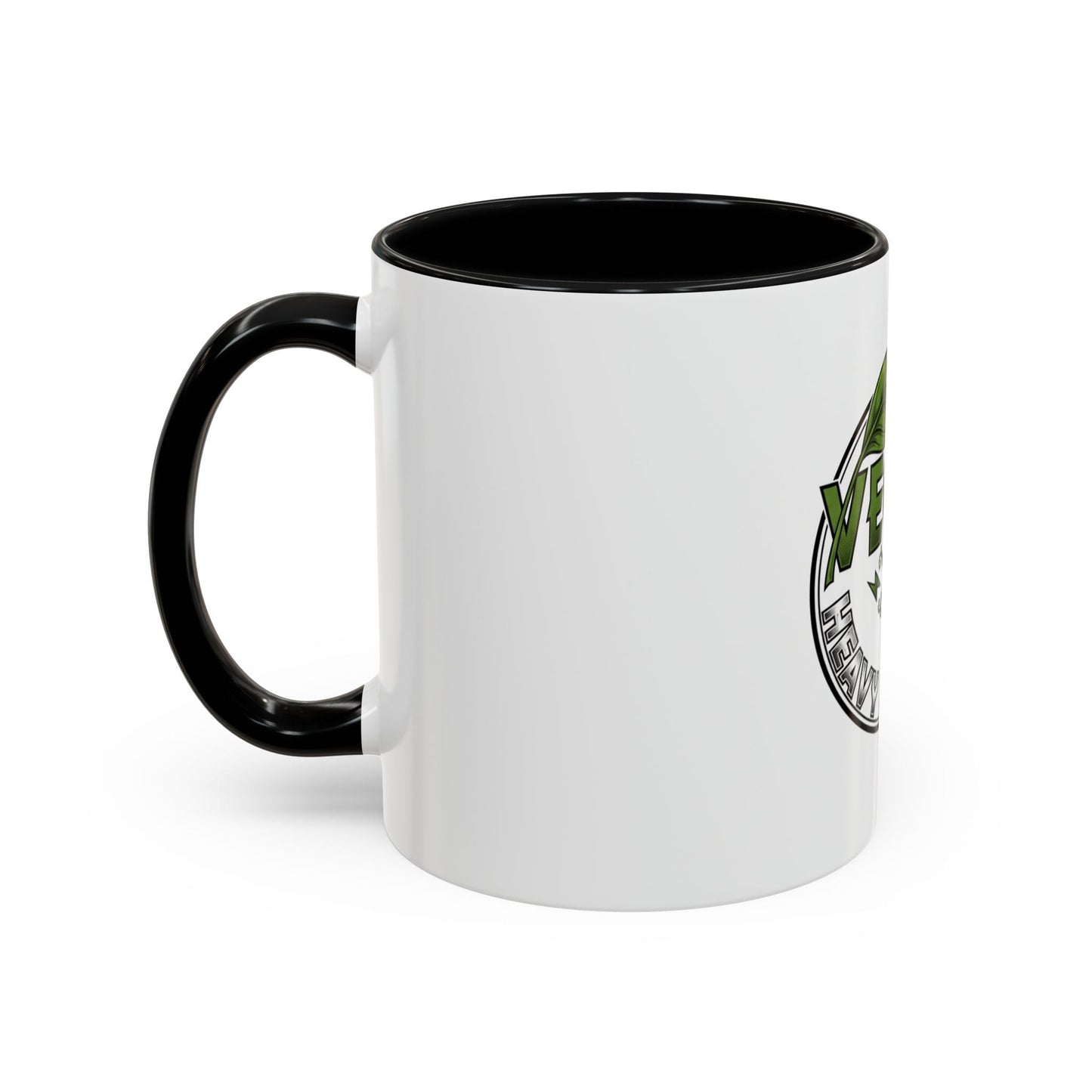 Glossy ceramic coffee mug with vegan heavy metal logo, white exterior, green leafy text, and colored handle, available in 11oz and 15oz sizes